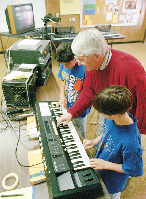 Tom and boys composing