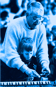 Tom and kid play keyboard